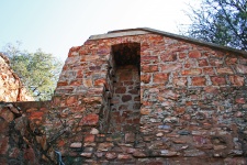 Tall Outer Wall Of Old Fort In Ruin