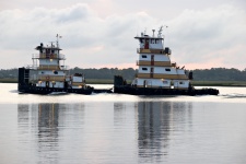 Tugboats On The River