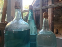 Turquoise Fluid In Bottles