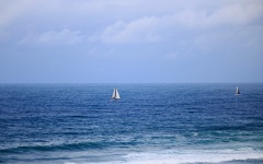 View Of Yachts On The Sea With Surf