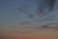 Waxing Crescent Moon At Sunset