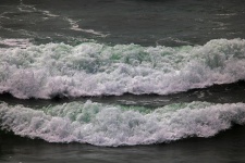 White Foamy Wave Rushing To Shore