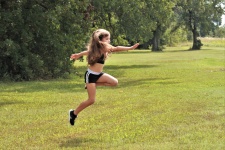 Young Girl Jumping In Air