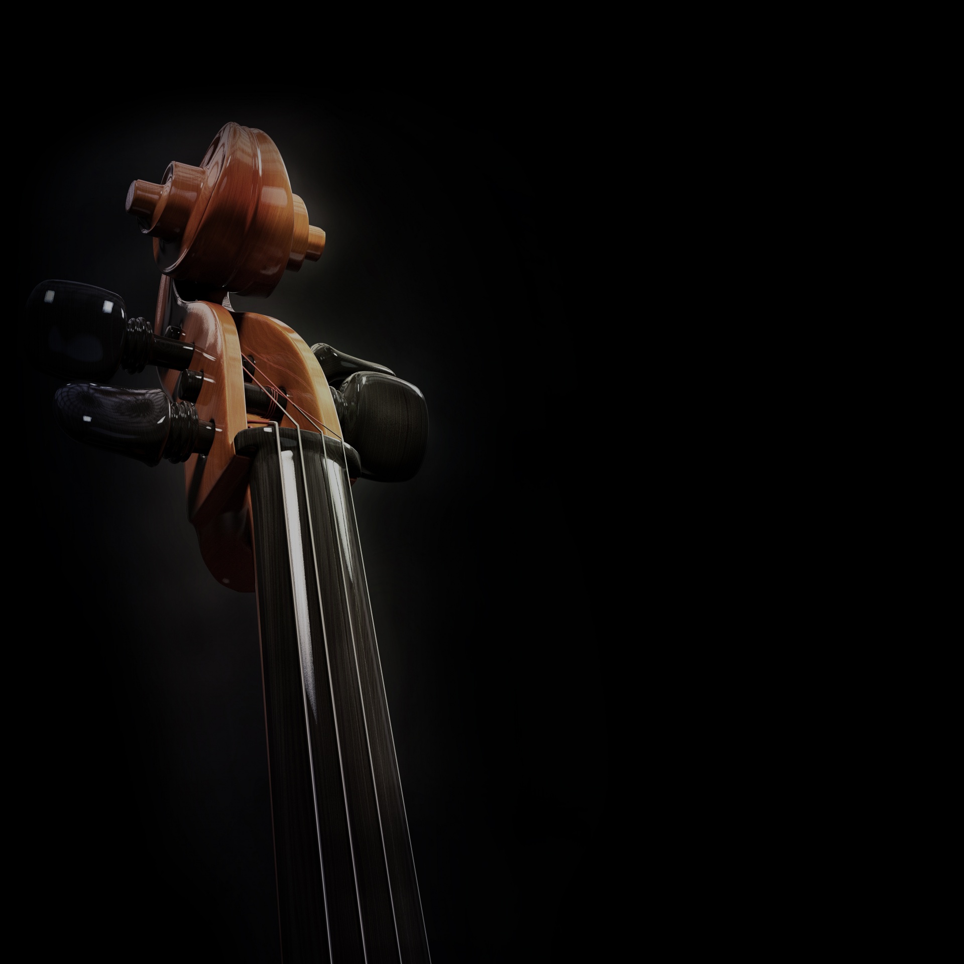 Cello in front of black background