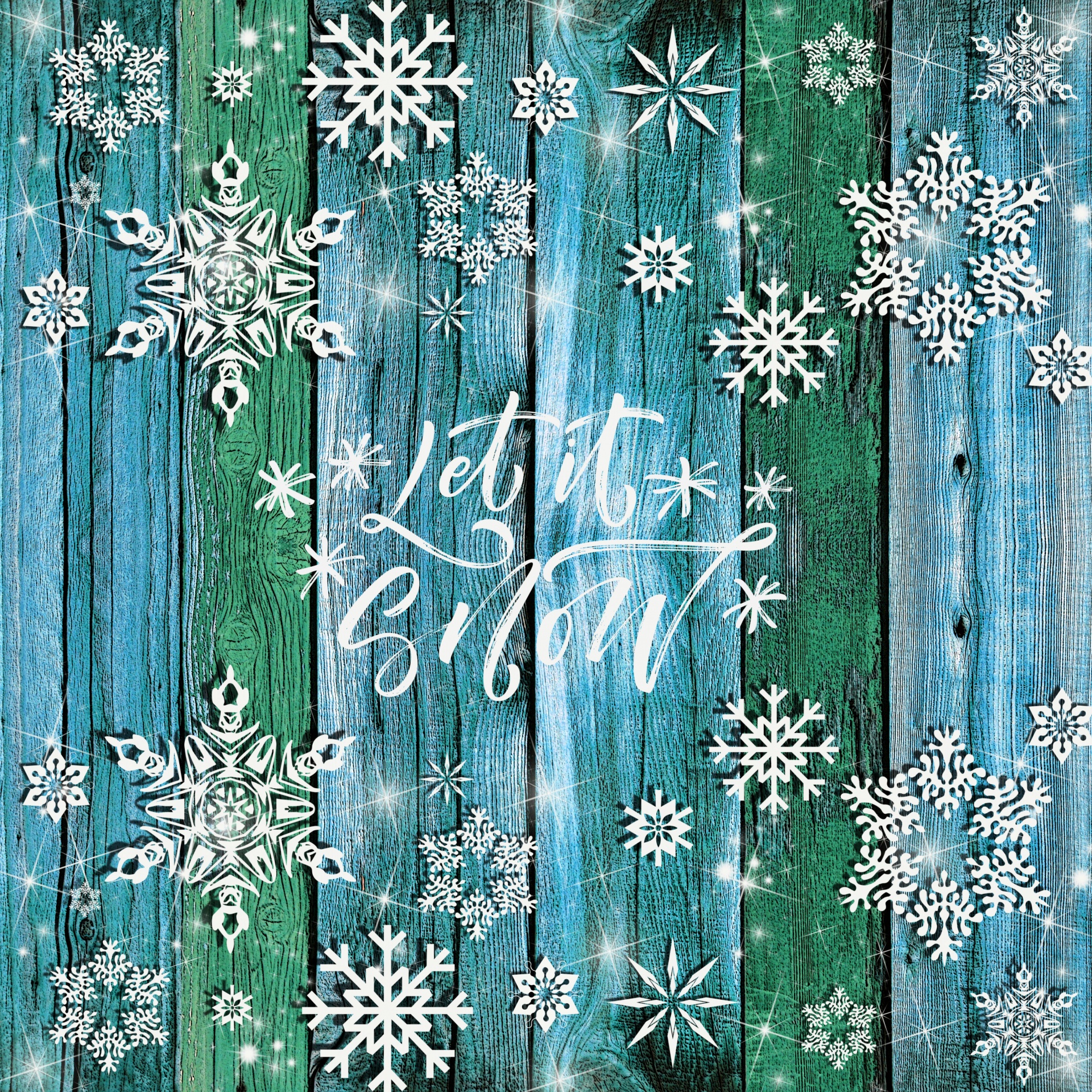 wooden fence with snow flake ornamentation at the top and bottom vertical and Let It Snow script
