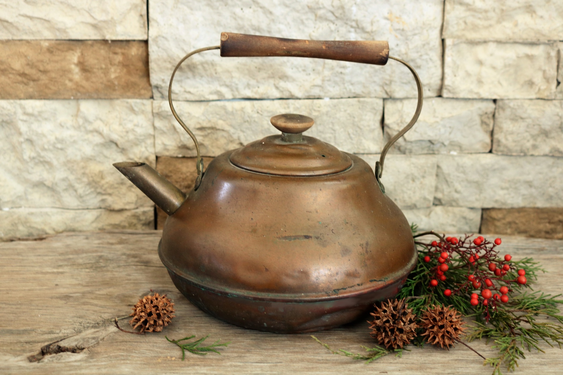 Vintage Copper Tea Pot On Wood