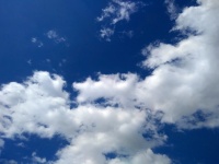 Bright Blue Sky With White Clouds