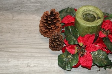 Christmas Candle And Poinsettias