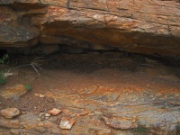 Dirt & Debris Under Rock Overhang