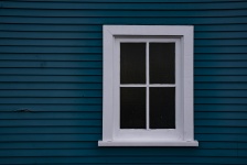White Framed Wood Window On Blue