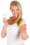 Woman With A Glass Of Water