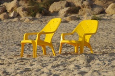 Yellow Chairs On Beach