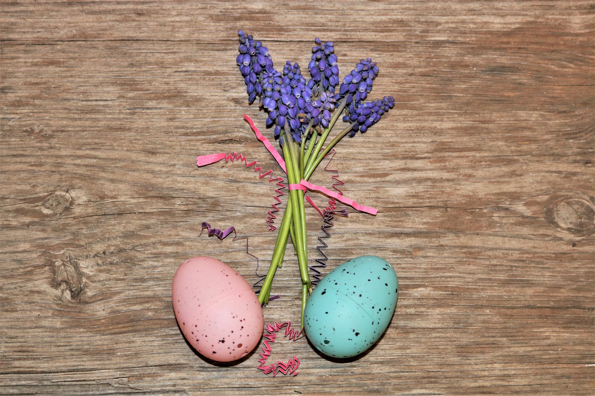 Easter Eggs And Muscari On Wood