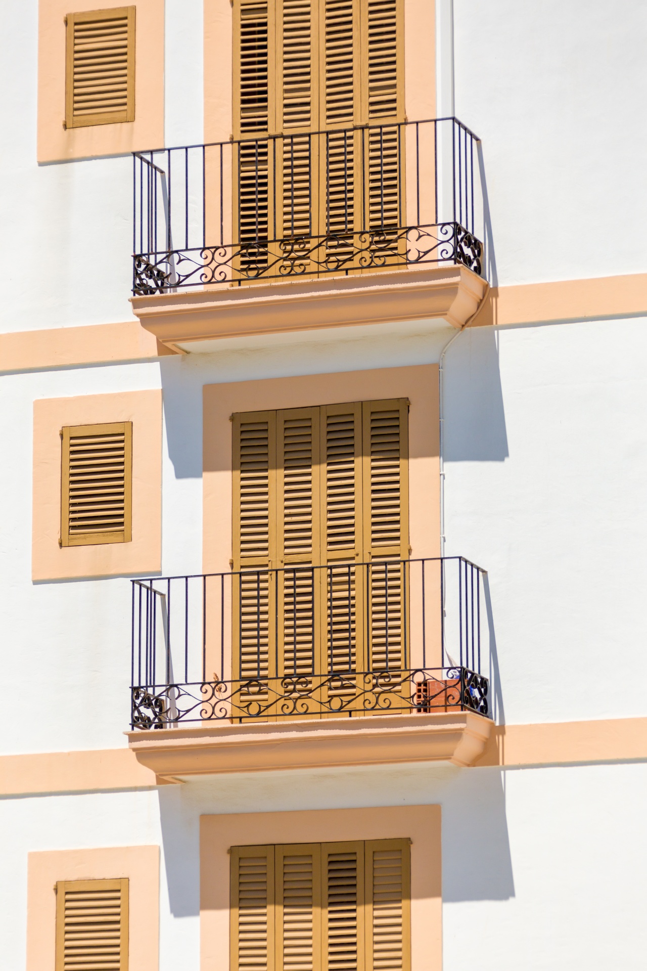 Orange and white Mediterranean balconies