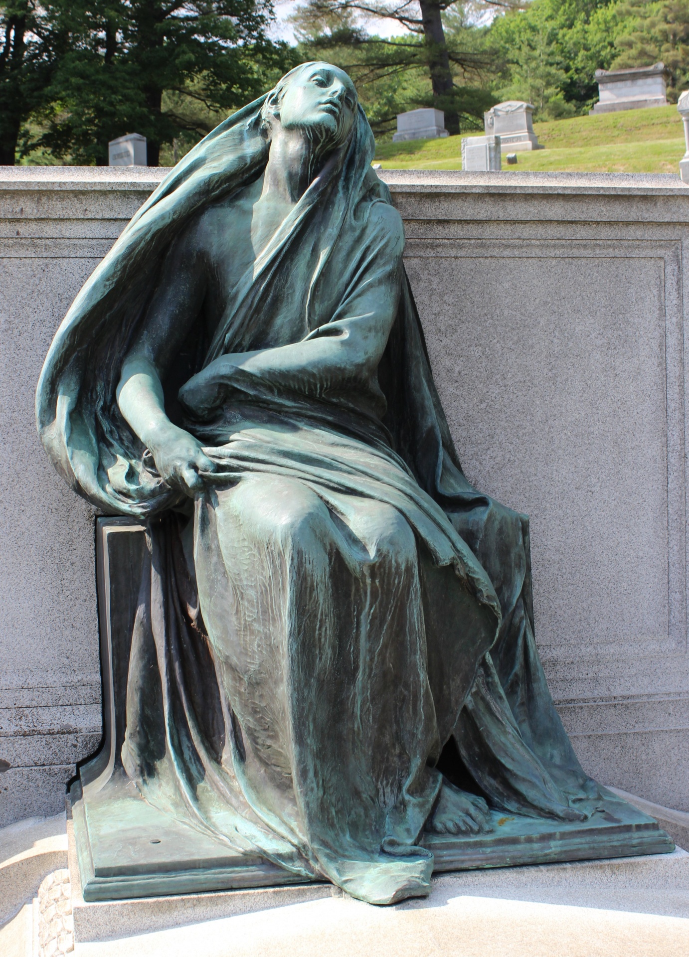 A copper statue located at Green Mount Cemetery in Montpelier, Vermont.
