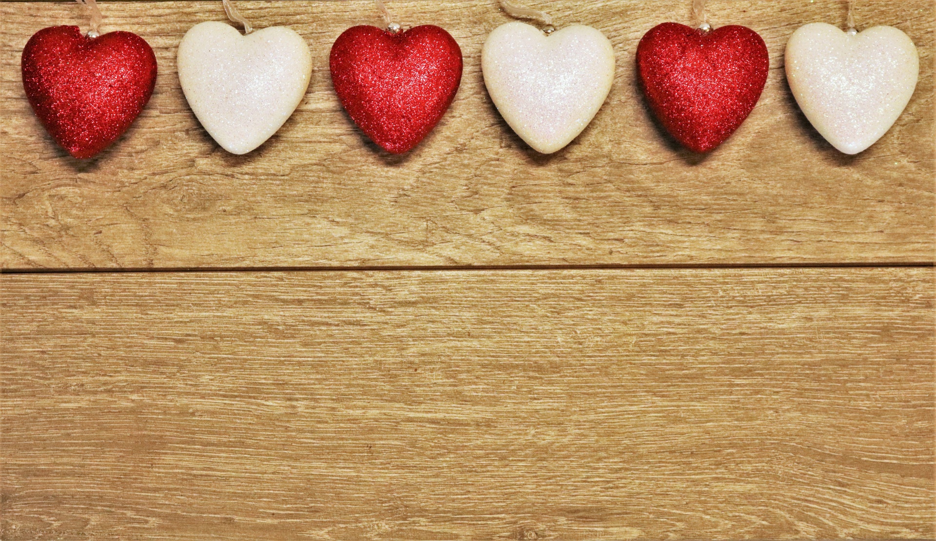 Red And White Hearts On Wood