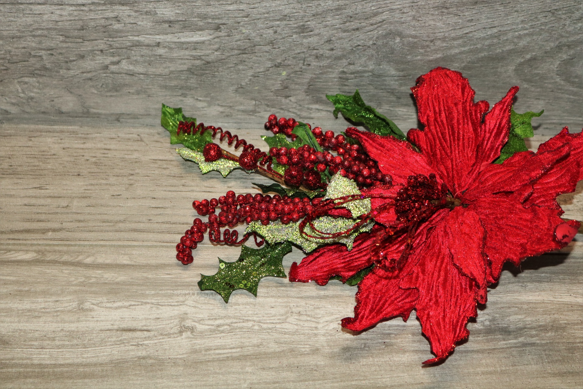 Red Poinsettia On Wood