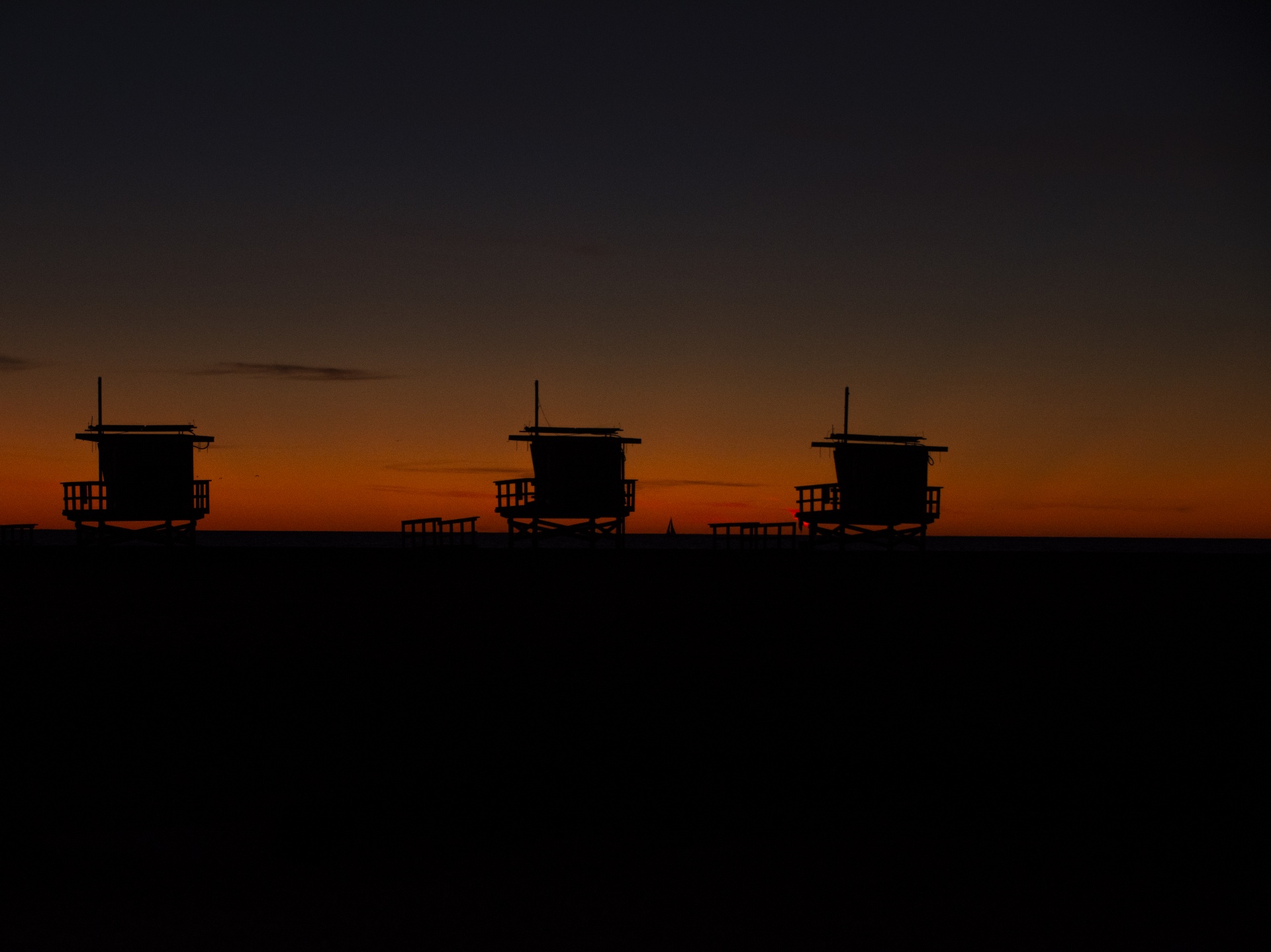 Silhouetted Lifeguard Stations