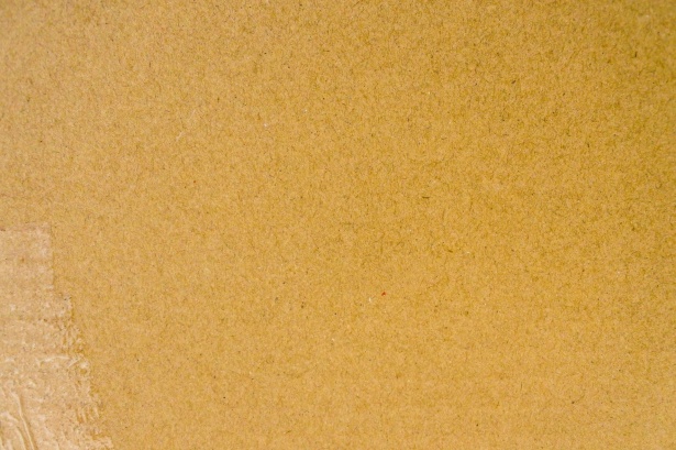 Brown recycled paper or cardboard paper texture background. Stock