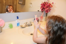 Little Girl Washing Her Hands