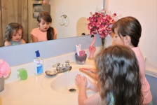 Two Little Girls Washing Hands