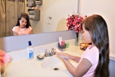 Young Girl Washing Her Hands