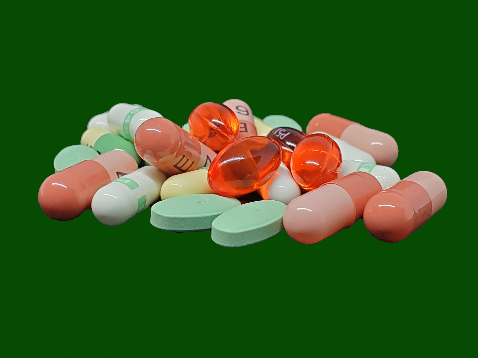 Pills On Green Background