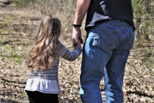Father And Daughter Holding Hands