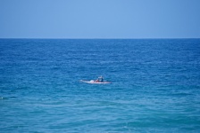 Person On Canoe On The Sea