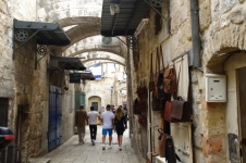 Tourists In Old City Alley