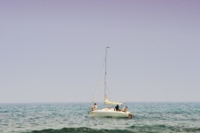 White Sailboat Against Open Sea