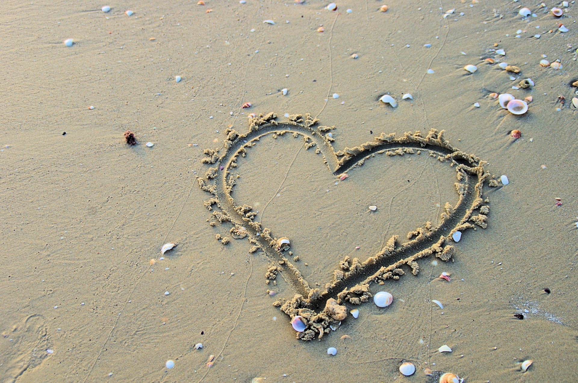 Heart Drawn In Sand On Beach