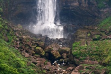 Base Of Waterfall Rushing Over Rock