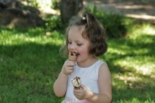 Little Girl Eating Ice Cream Cone