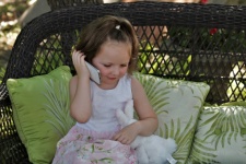 Little Girl Talking On Phone