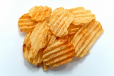 Snack Potato Chips Heaps On A White Back
