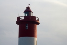 Top Of White And Red Lighthouse