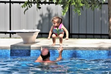 Little Girl At Swimming Pool