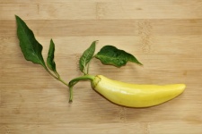 Banana Pepper On Wood Background