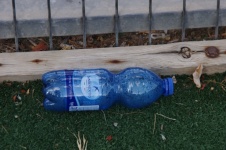 Discarded Blue Plastic Water Bottle