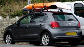 Volkswagen Car With Kayak On Roof