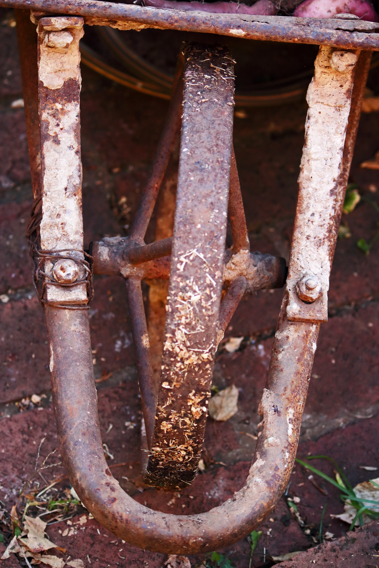 front part and wheel of old wheelbarrow