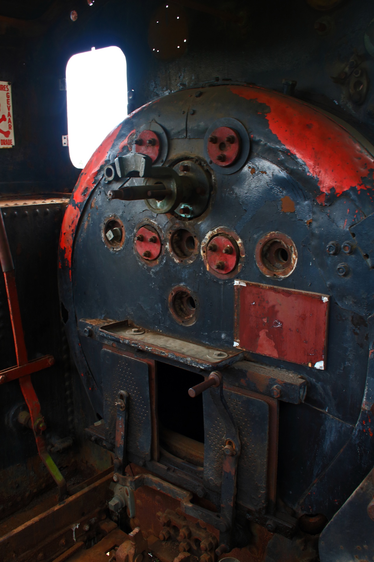 inside view of an old steam locomotive cab