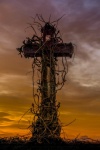 Cross Against Sunset Sky
