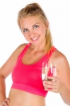 Fit Woman With A Glass Of Water