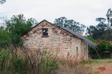 Old Stone Farm Building With Reeds