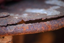 Rusted Edge On An Old Wheelbarrow