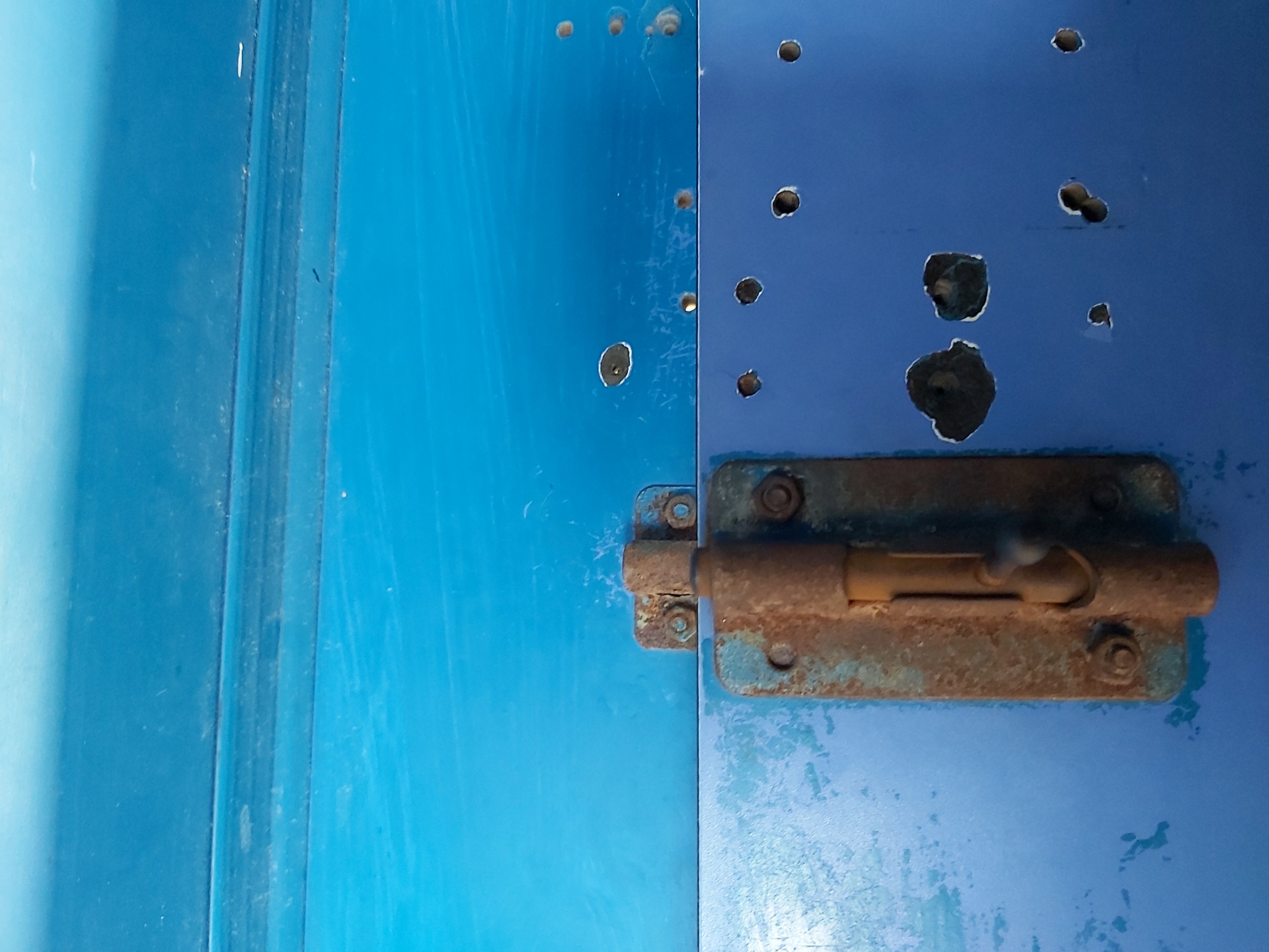 Blue Door With Rusted Lock