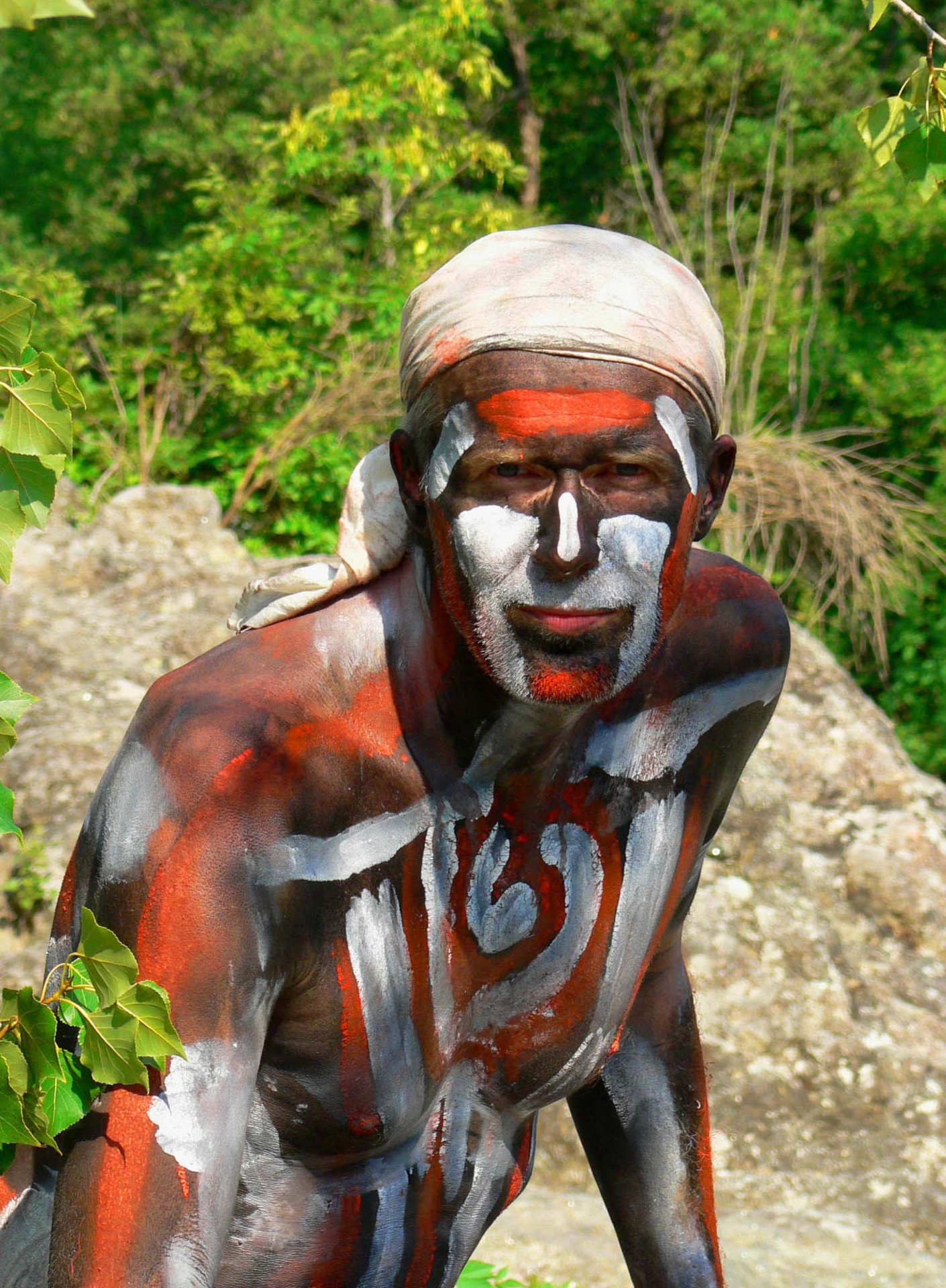 Man body painting wild nature shaman shamanism vision quest trance dance face red esoteric ritual psychology therapy religion god spirituality seminar initiation ceremony tribe wilderness chief chief coach power Australia