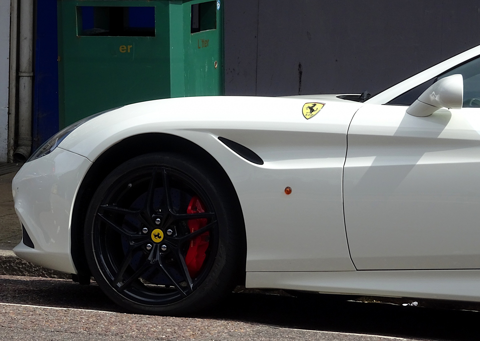White Ferrari Car Front Wheel And Door Mirror